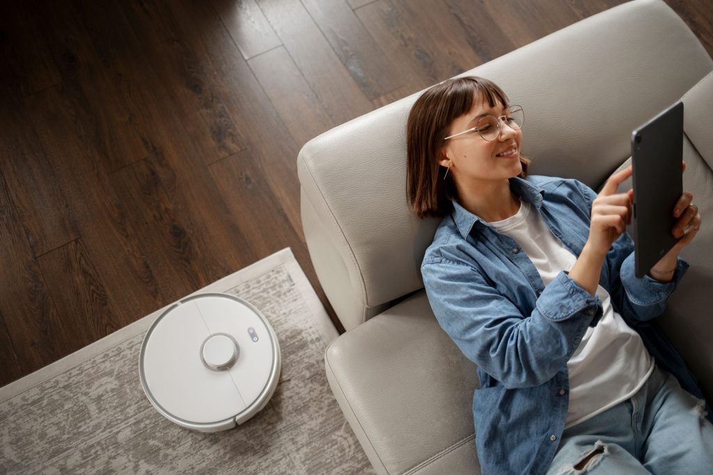 young woman using home technology web